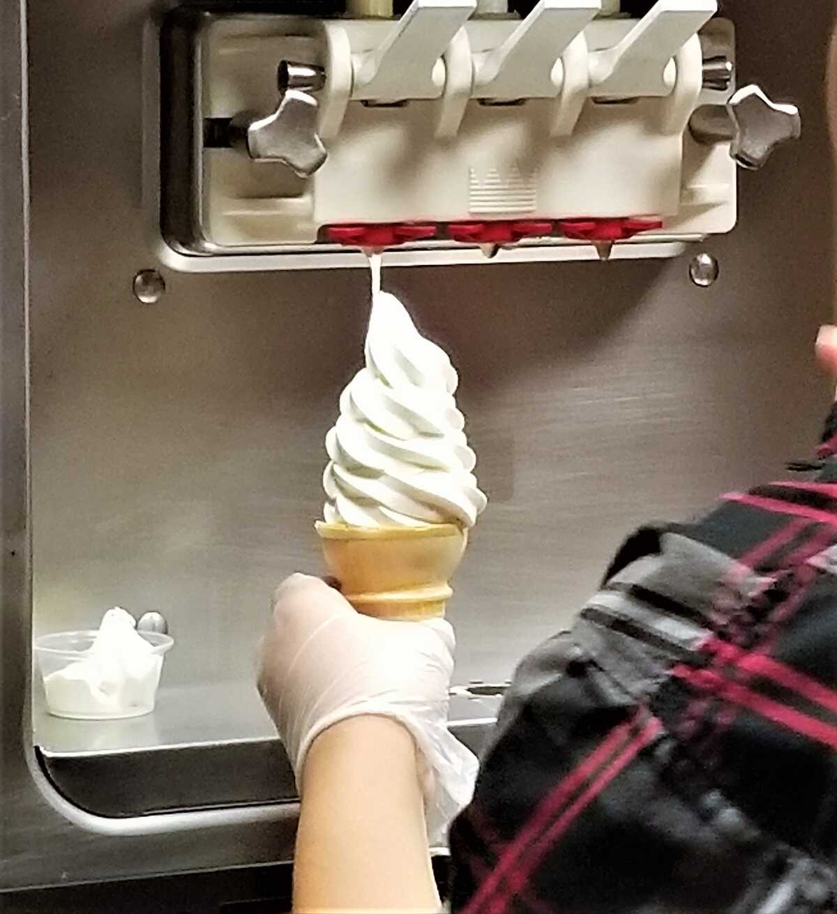 making a soft serve ice cream cone