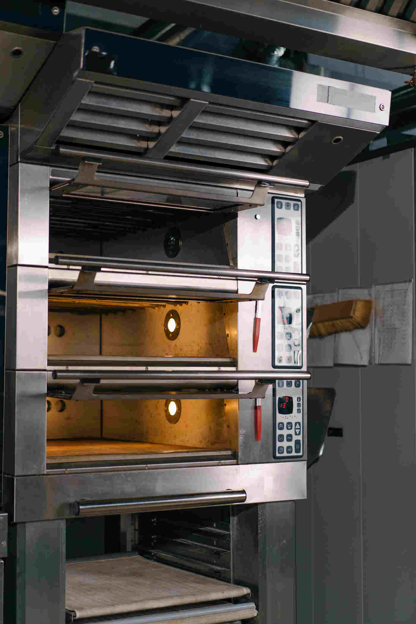 commercial ovens in the hot side of a restaurant