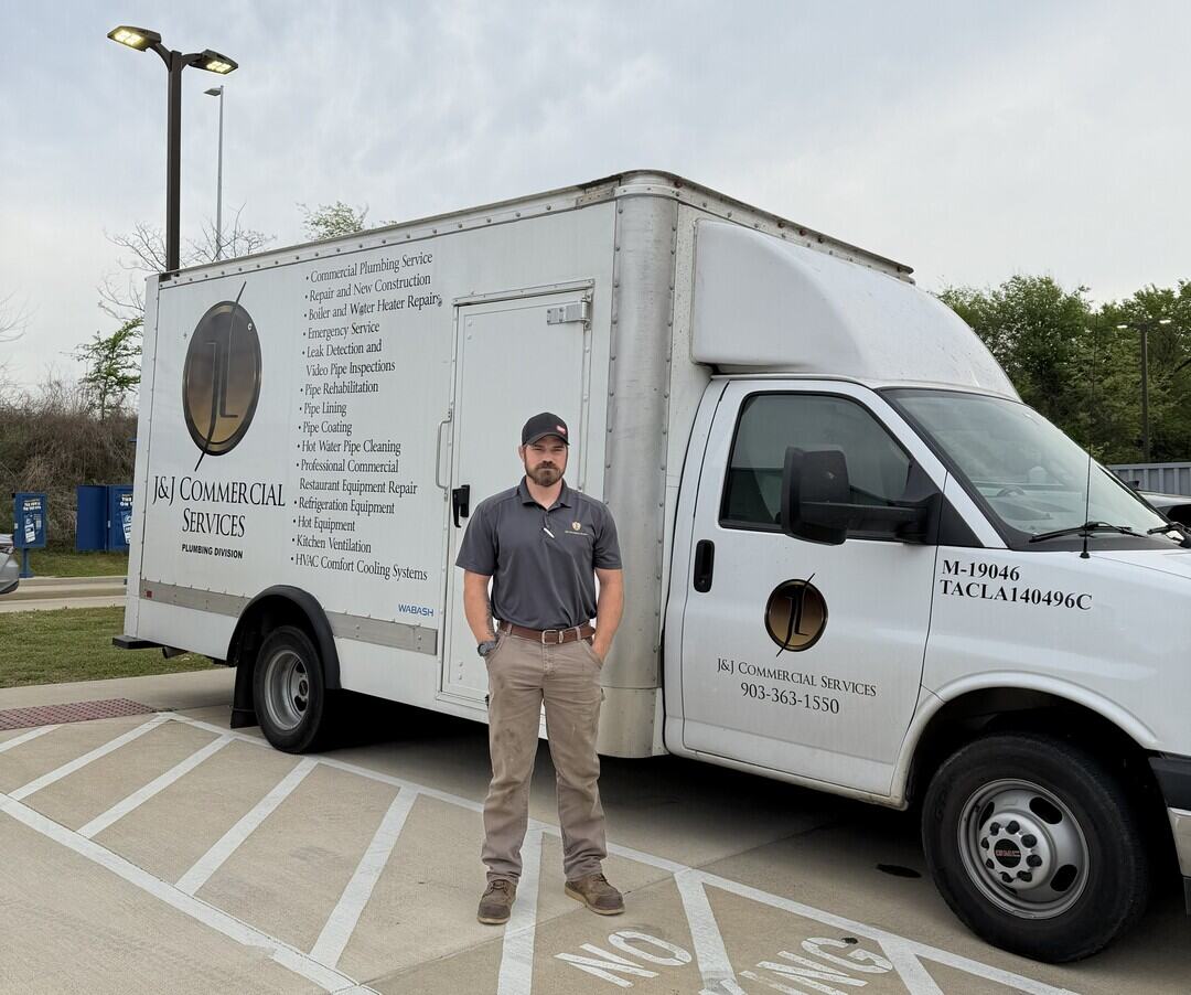 j&j commercial services contractor in front of his commercial kitchens service truck