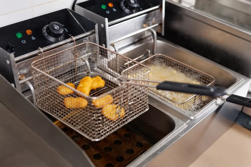 cafeteria hot side fryers in action