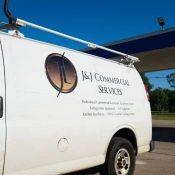 J&J Commercial Services white company vehicle