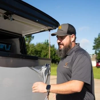 J&J Commercial Services worker in a company uniform