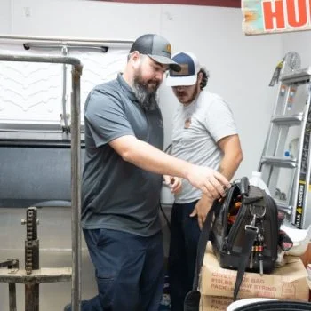 J&J Commercial Services workers in a workshop